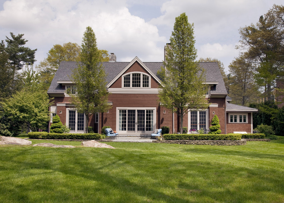 Inspiration for a mid-sized timeless two-story wood gable roof remodel in Boston