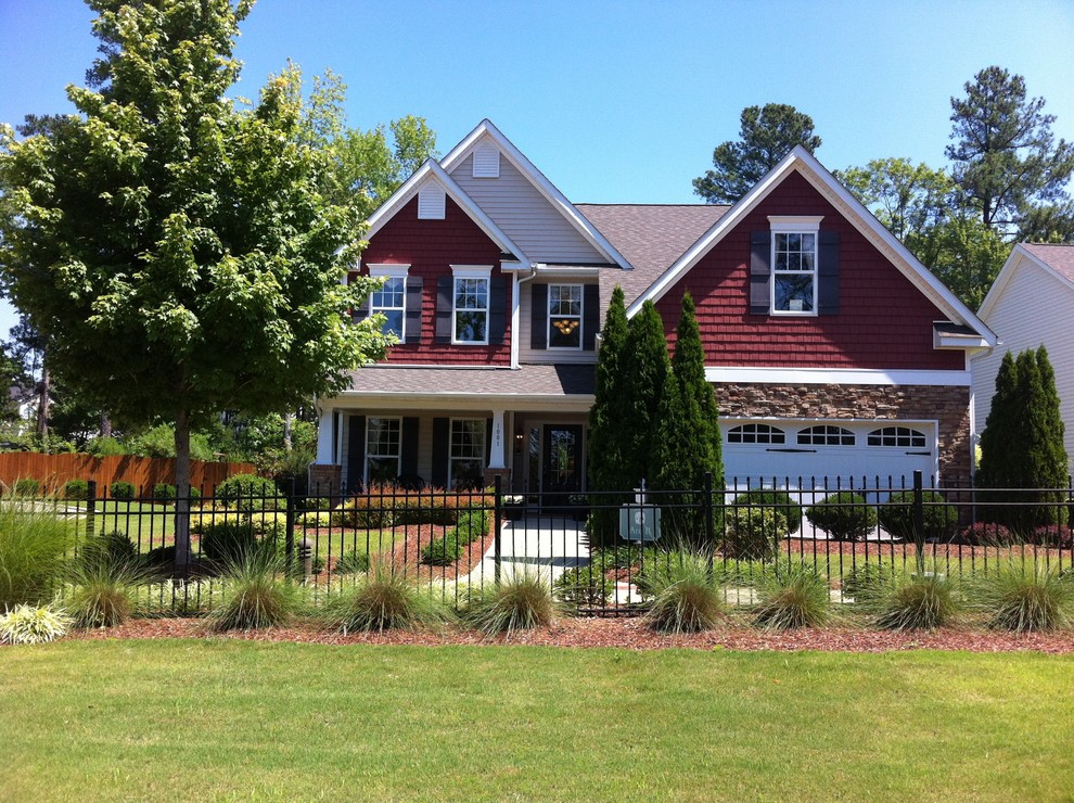 Design ideas for a traditional house exterior in Raleigh.