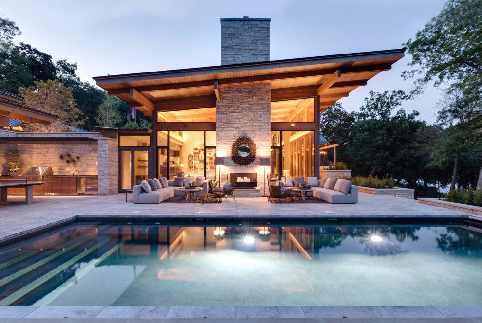 Pine Lake Pool and Patio of Private Lakeside Wisconsin Resort Home