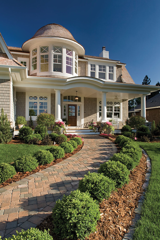 Inspiration for a victorian two-story wood exterior home remodel in St Louis