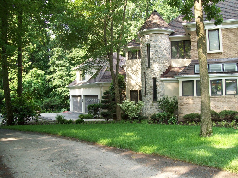 Expansive and beige classic two floor detached house in Baltimore with mixed cladding, a hip roof and a shingle roof.
