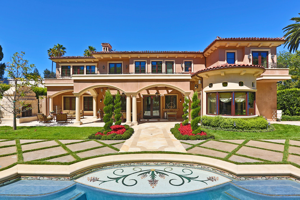 Inspiration for a mediterranean stucco exterior home remodel in Los Angeles