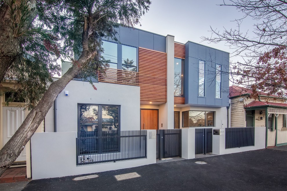 Mittelgroßes, Zweistöckiges Modernes Haus mit Mix-Fassade und Flachdach in Melbourne