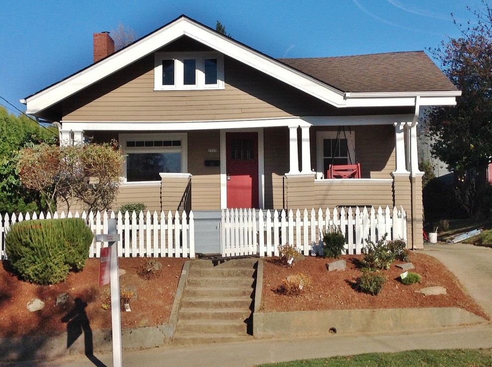 Small craftsman brown one-story wood gable roof idea in Portland