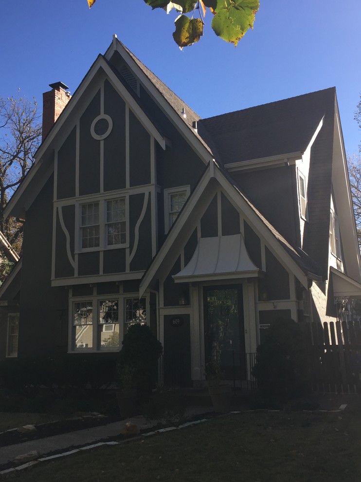 Mid-sized two-story stucco gable roof photo in Kansas City