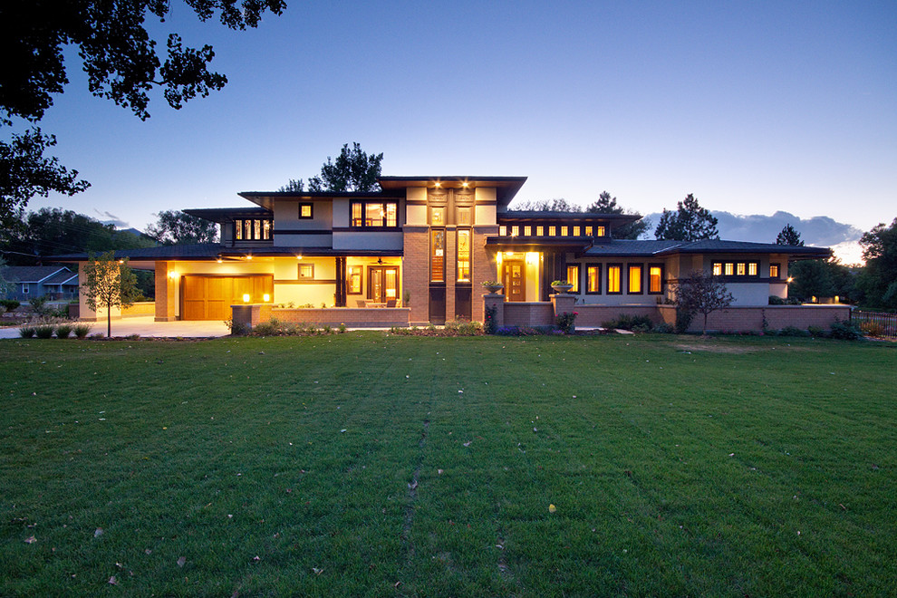 Example of an arts and crafts two-story mixed siding exterior home design in Denver