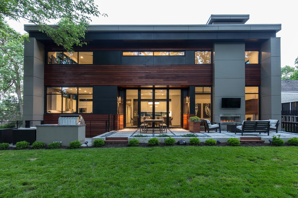 Large minimalist gray two-story mixed siding exterior home photo in Kansas City