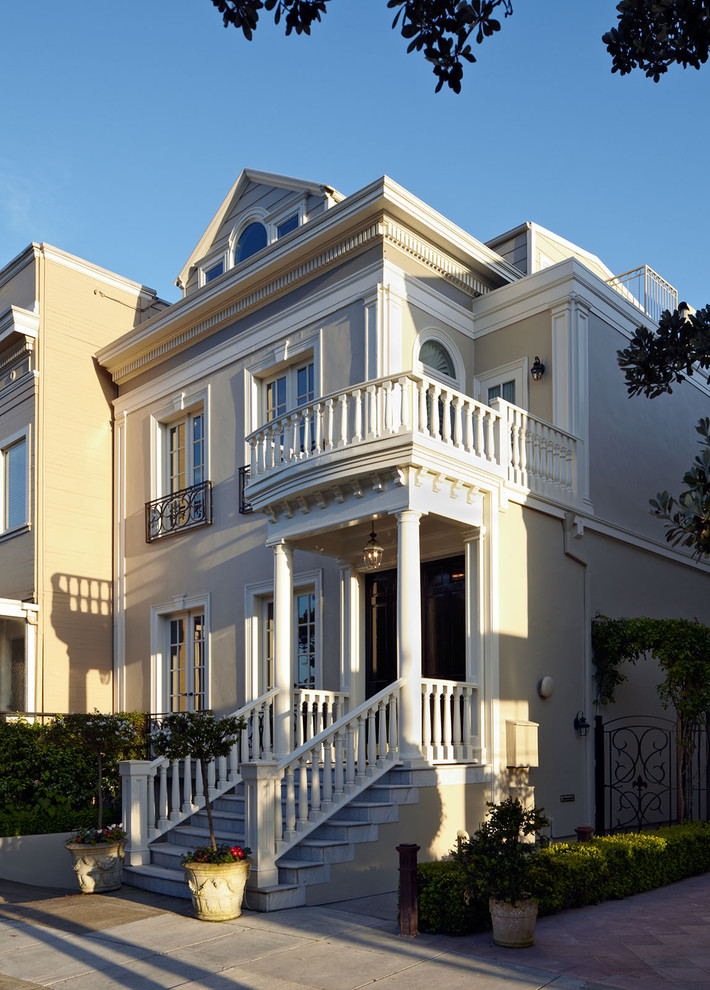 Large victorian house exterior in San Francisco with three floors.