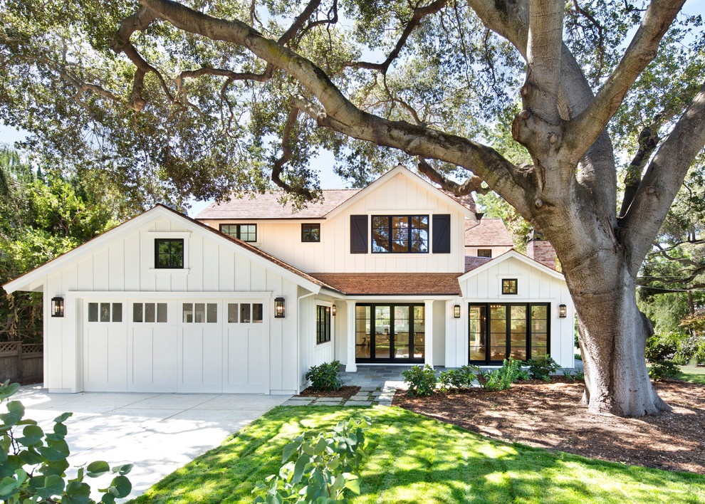 Country white two-story wood gable roof idea in San Francisco