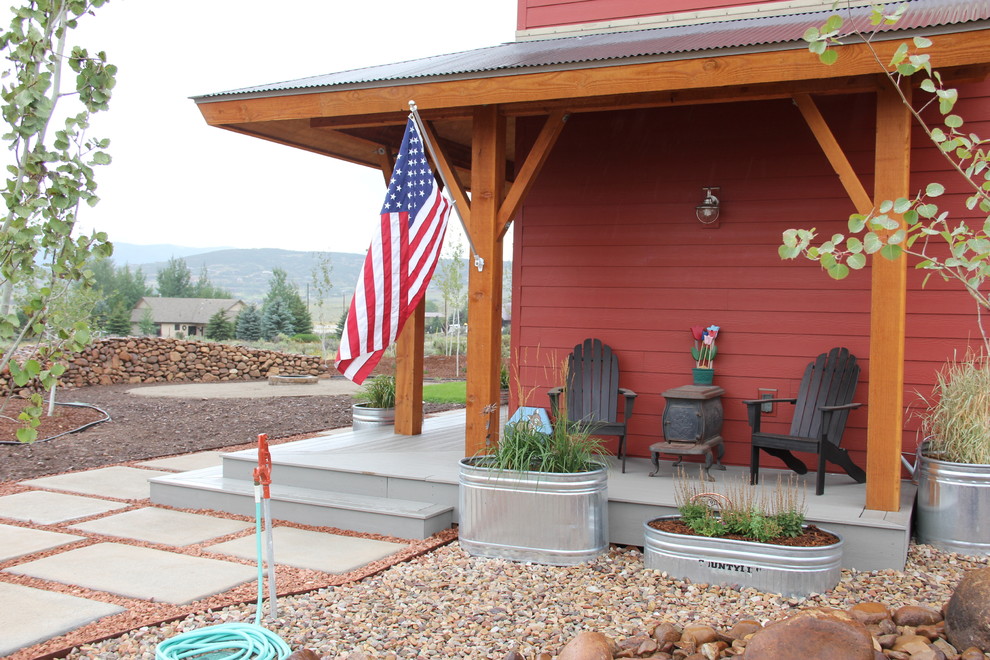 Inspiration for a medium sized and red country two floor house exterior in Salt Lake City.