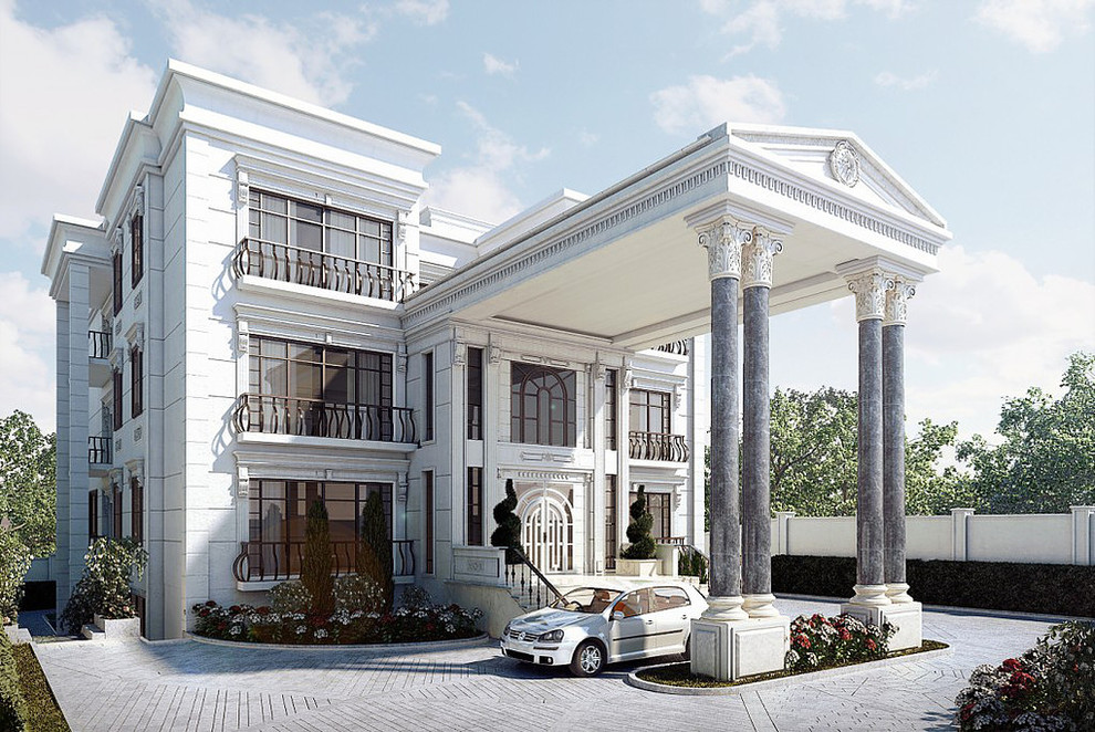 Inspiration pour une grande façade de maison blanche méditerranéenne en pierre à deux étages et plus avec un toit à deux pans.