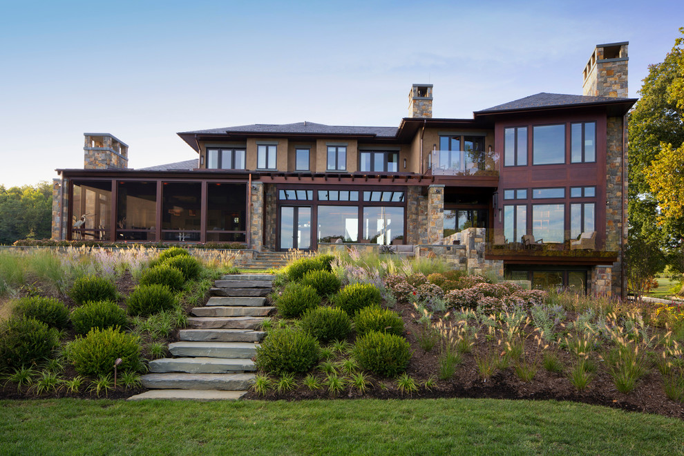 Contemporary two floor house exterior in Baltimore with mixed cladding and a hip roof.