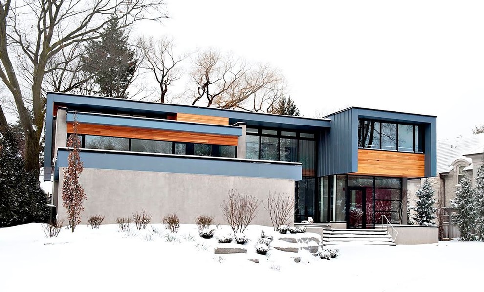 Design ideas for a contemporary house exterior in Toronto.