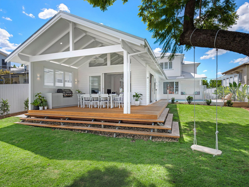 Inspiration for a large modern white two-story wood exterior home remodel in Brisbane with a metal roof