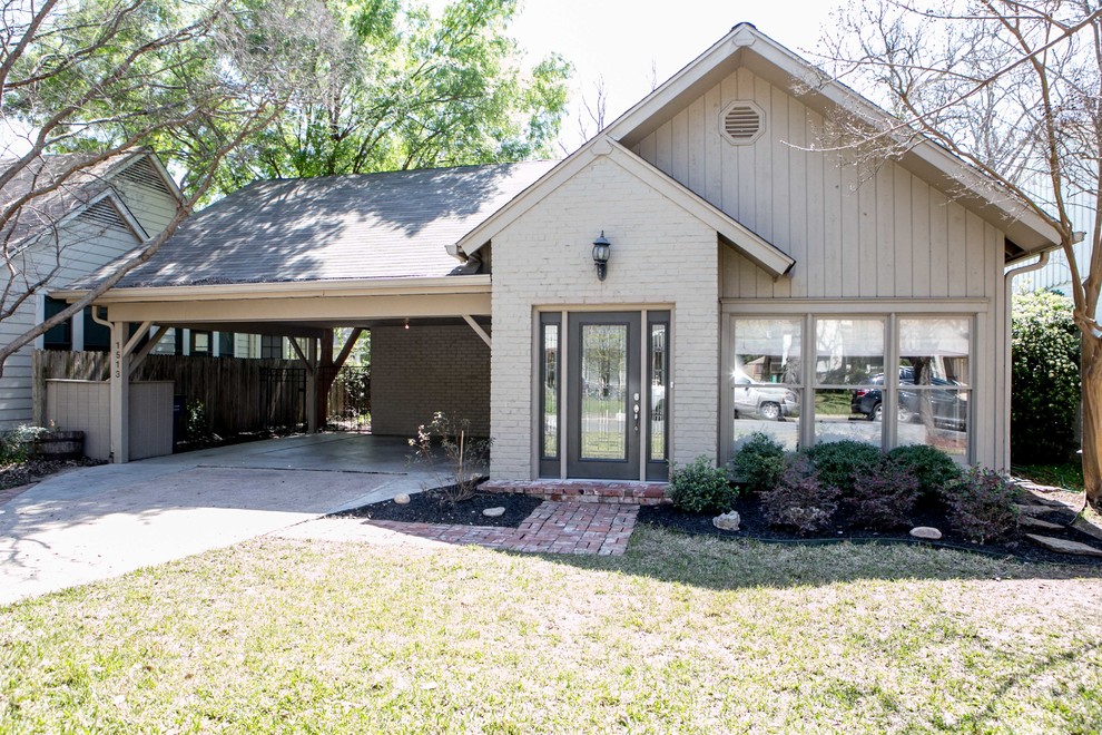 Mid-sized transitional gray one-story mixed siding gable roof photo in Austin