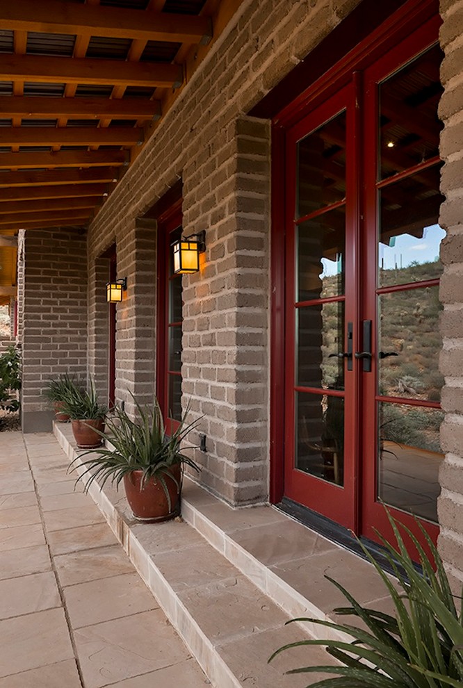 Rustic exterior home idea in Phoenix