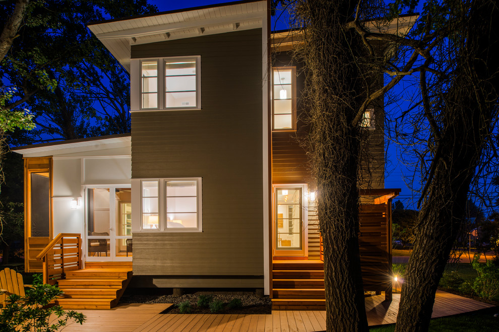 Inspiration for a contemporary gray two-story vinyl house exterior remodel in Philadelphia