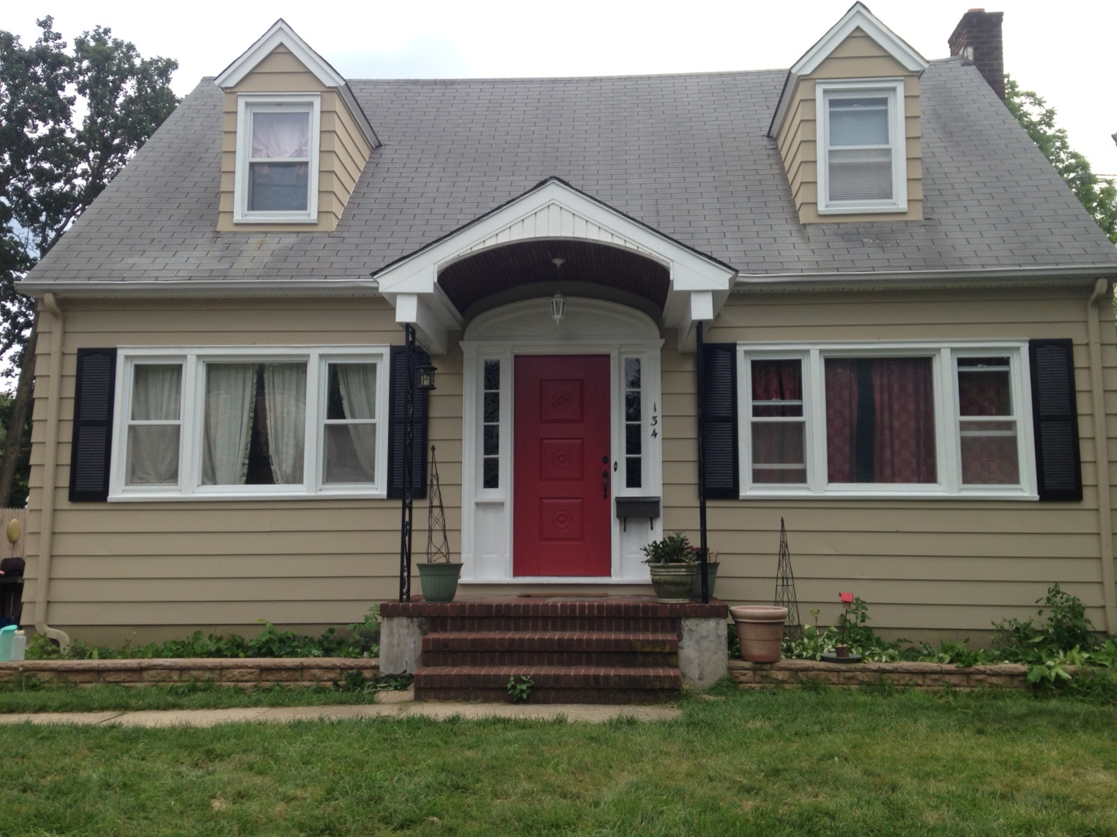 Gray House, Red Door, Black Shutters Discover the Bold & Modern Look!