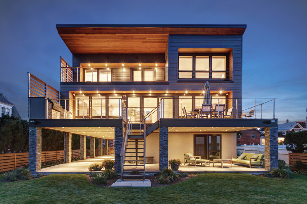 This is an example of a large contemporary house exterior in Providence.