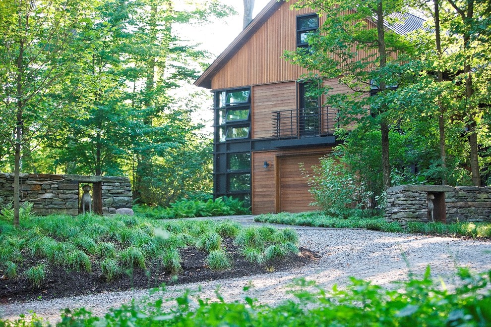 Inspiration for a rustic house exterior in Burlington.