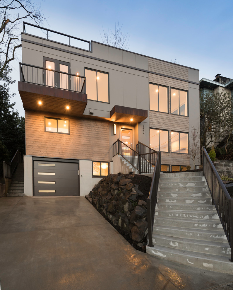 シアトルにある高級なコンテンポラリースタイルのおしゃれな家の外観 (コンクリート繊維板サイディング) の写真