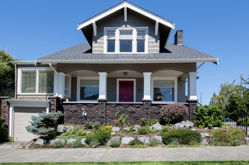 Photo of a medium sized and gey traditional two floor detached house in Seattle with mixed cladding, a pitched roof and a shingle roof.