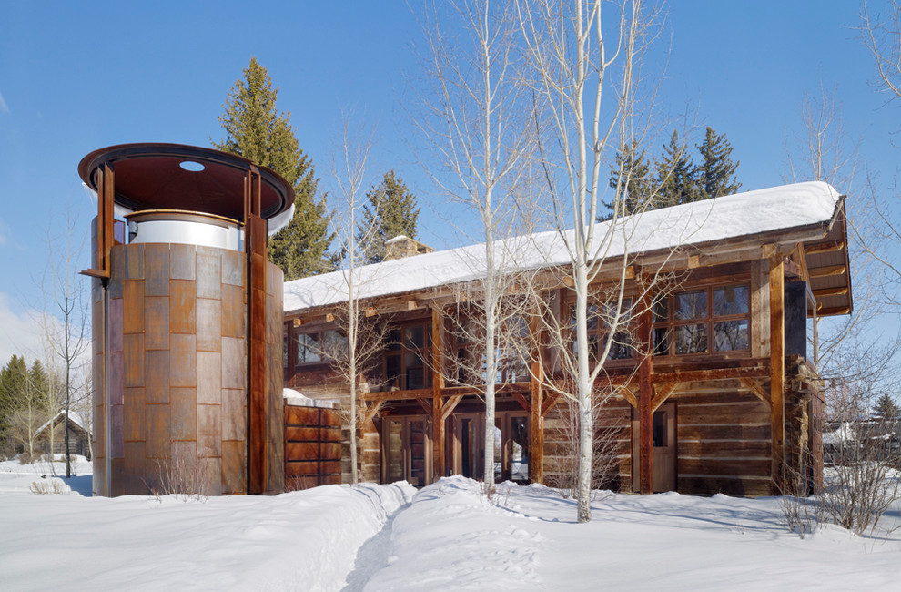 Example of a mountain style mixed siding exterior home design in Salt Lake City