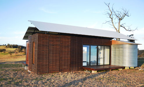 Exemple d'une façade de maison container tendance.