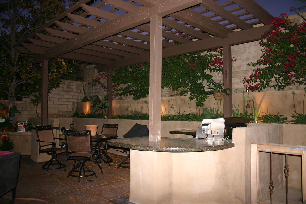 This is an example of a medium sized mediterranean patio in Los Angeles.