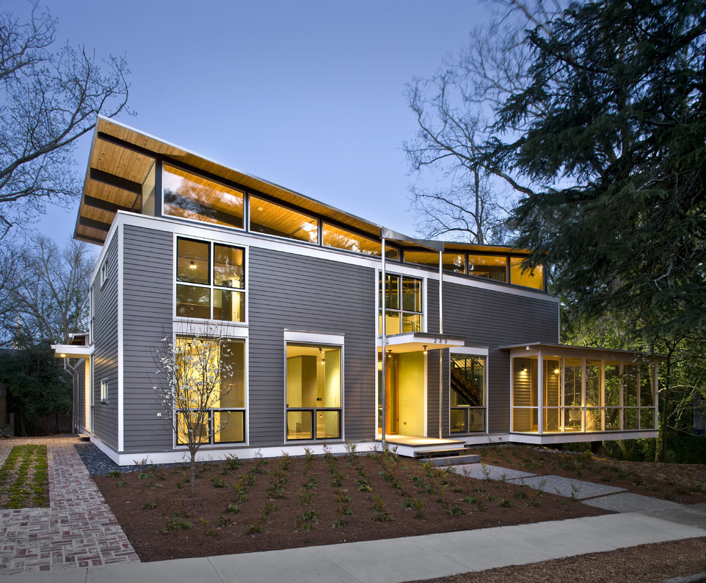 Inspiration for a medium sized and gey contemporary two floor house exterior in Atlanta with wood cladding.