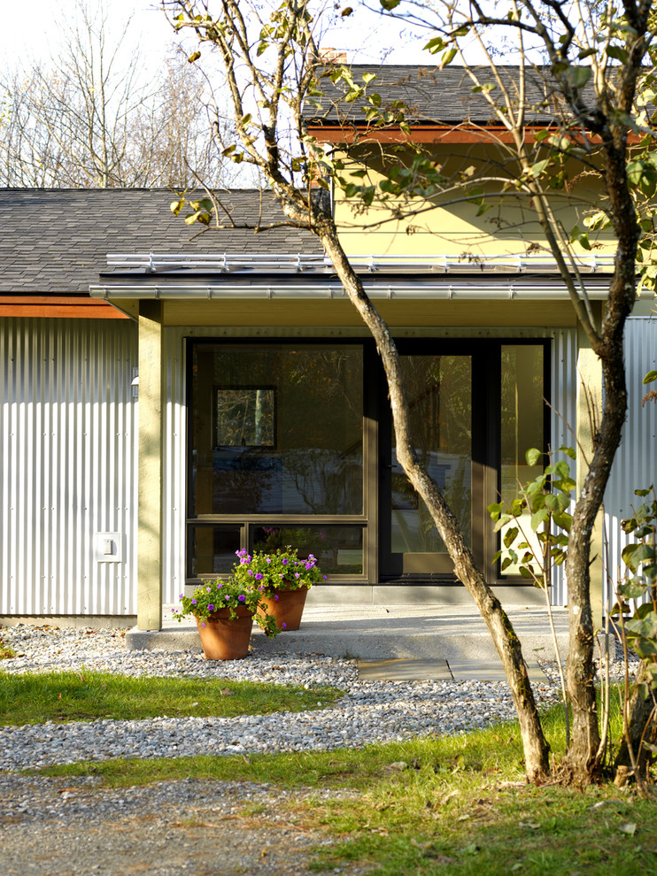 Mountain style metal exterior home photo in Burlington