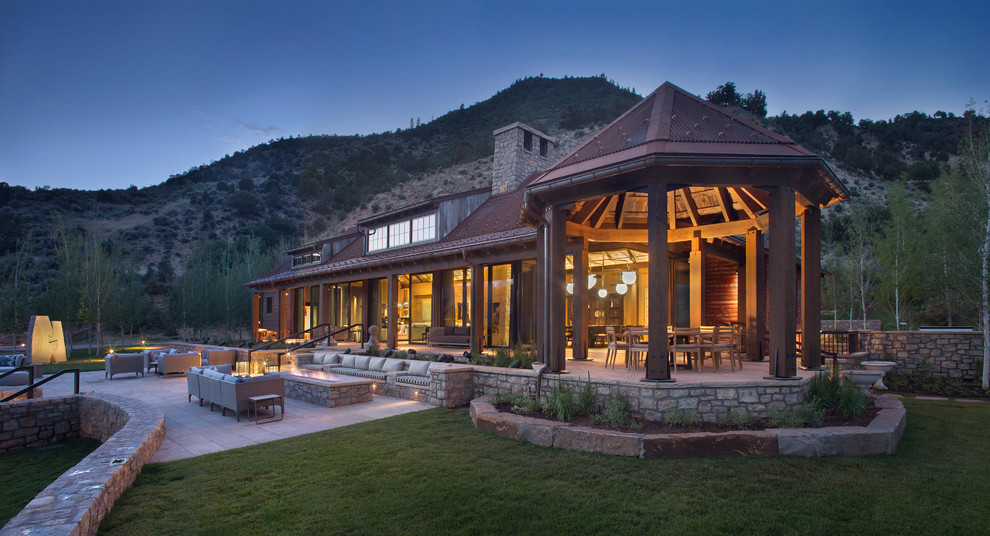 Example of a mountain style brown one-story exterior home design in Denver