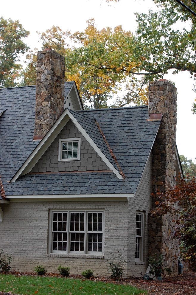 Inspiration for a mid-sized transitional gray two-story mixed siding exterior home remodel in Richmond with a shingle roof