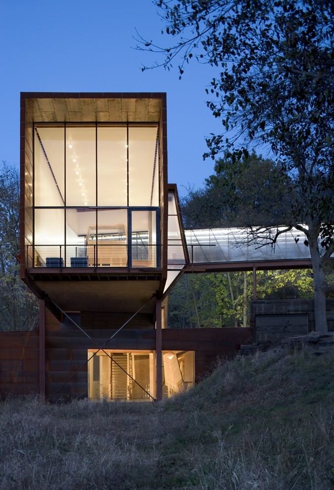 Inspiration for an industrial two-story exterior home remodel in Omaha
