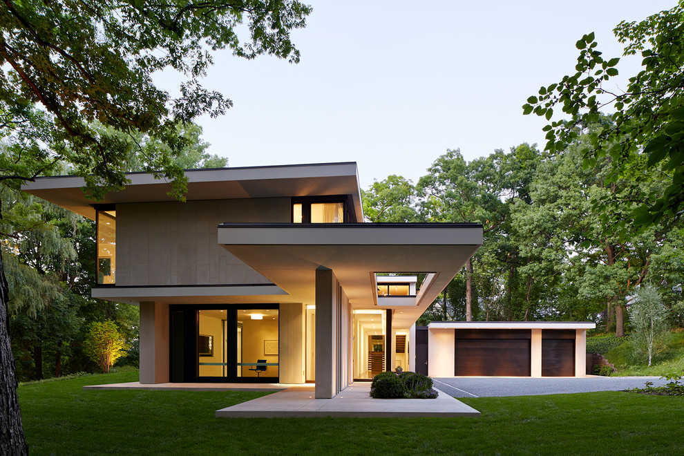 Zweistöckiges Modernes Einfamilienhaus mit Steinfassade, beiger Fassadenfarbe und Flachdach in Chicago