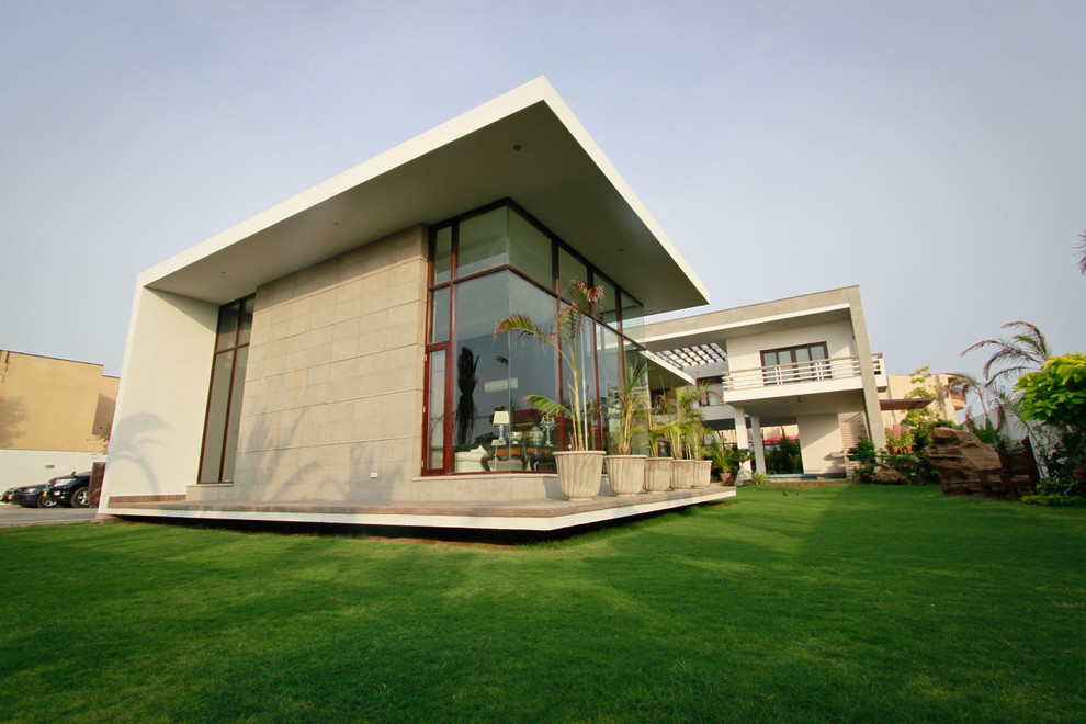 Photo of a contemporary two floor house exterior in Other.