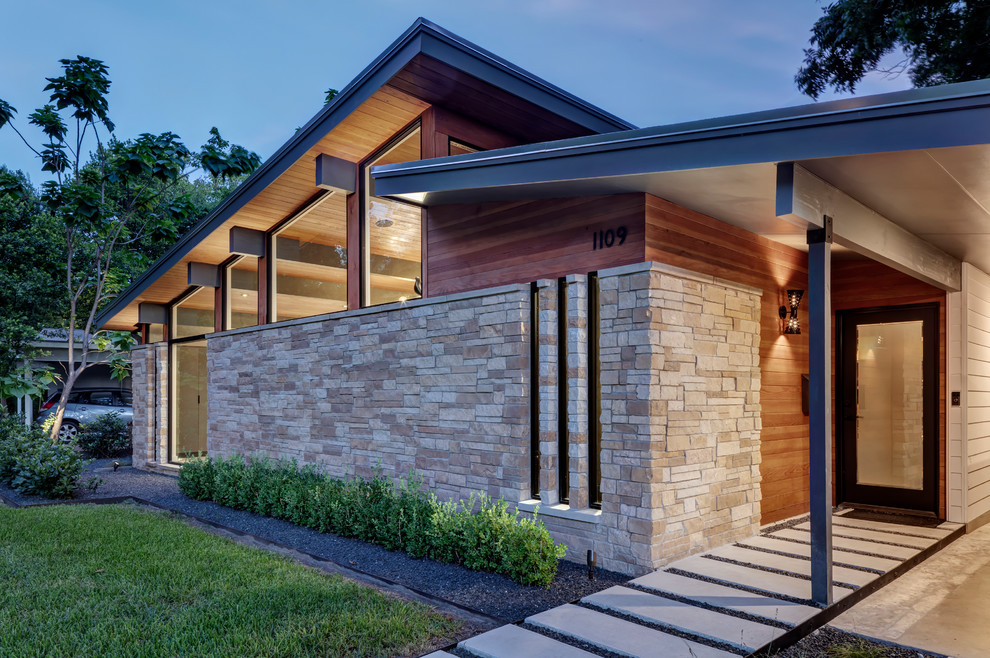1960s one-story brick house exterior idea in Austin