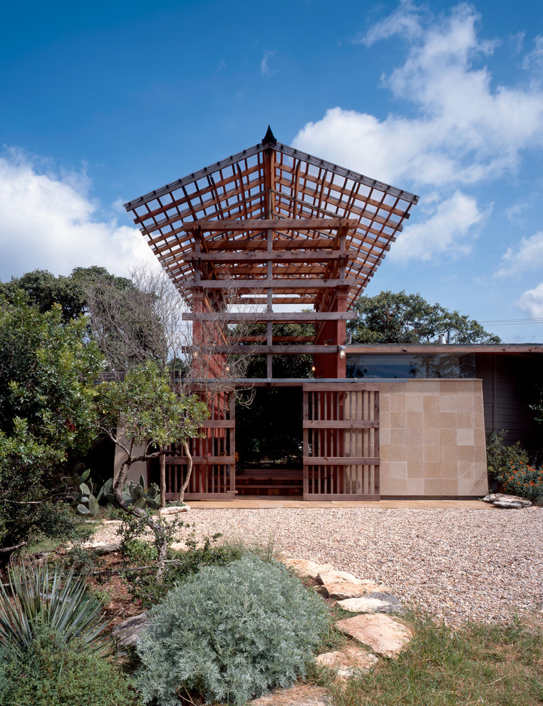 This is an example of a contemporary bungalow house exterior in Austin.