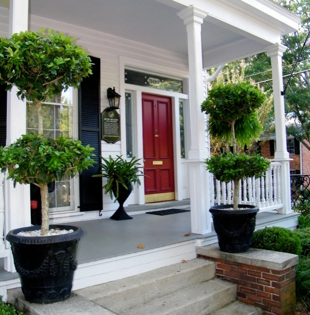 Design ideas for a large and white victorian detached house in New Orleans with wood cladding.