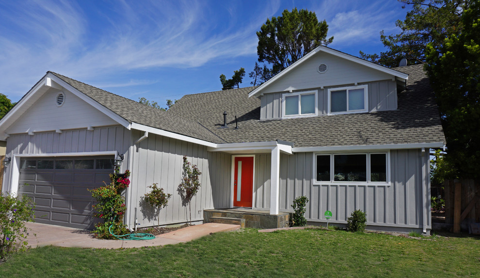 Example of a mid-sized classic gray two-story mixed siding exterior home design in San Francisco with a shingle roof