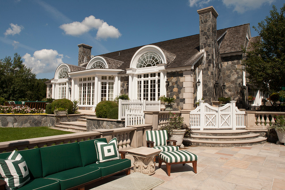 Traditional stone exterior home idea in New York