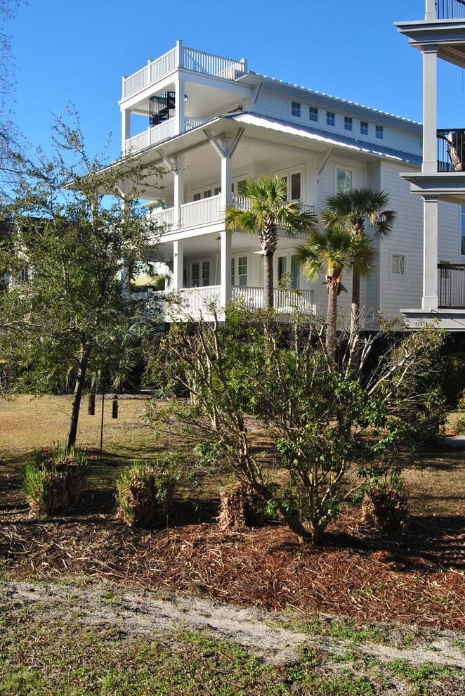 Design ideas for a beach style house exterior in Charleston.