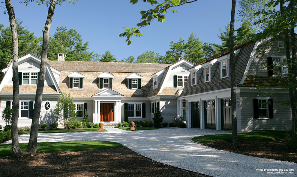 Inspiration for a huge farmhouse gray two-story wood exterior home remodel in Boston