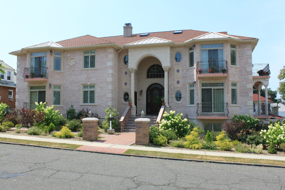 This is an example of a mediterranean house exterior in New York.