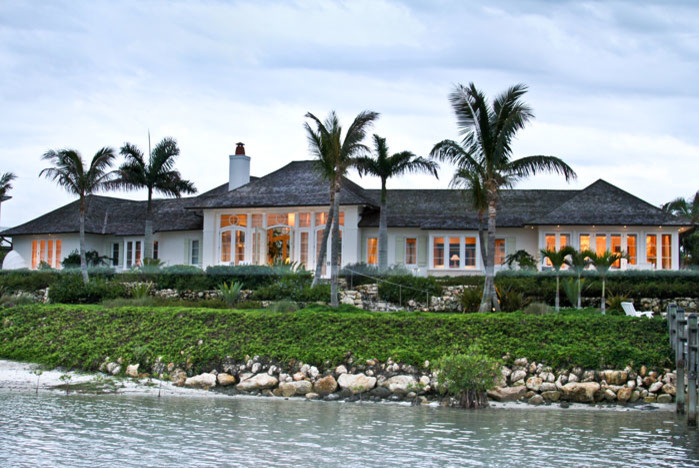 Design ideas for a world-inspired house exterior in Miami.