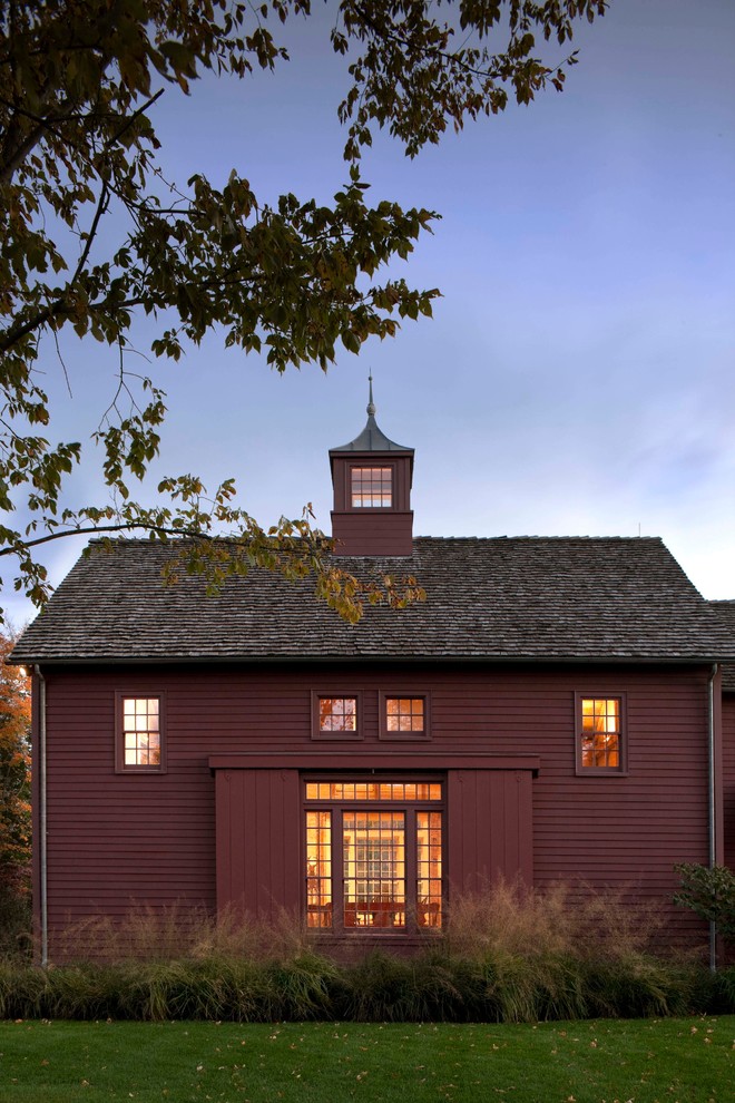Cottage two-story wood exterior home photo in New York