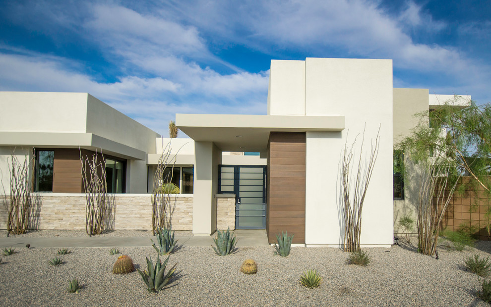 Example of a minimalist exterior home design in Other