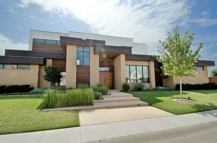 Large modern multicolored two-story mixed siding exterior home idea in Dallas