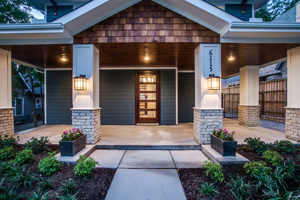 Inspiration for a mid-sized craftsman blue two-story wood house exterior remodel in Dallas