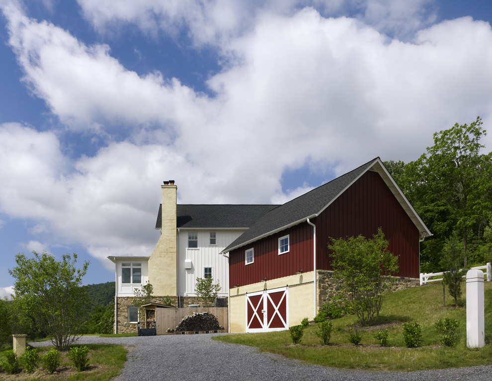 Inspiration for a country stone exterior home remodel in DC Metro